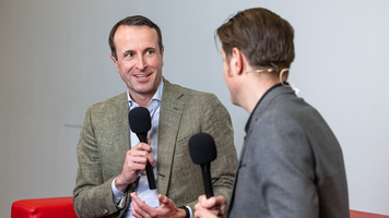 Oliver Ganser, vice president of digitalisation of the purchasing and supplier network at BMW Group on the 'red sofa' at ALSC DS Europe 2025.