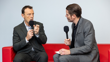 JC Deville, vice president of supply chain at Toyota Motor Europe, on the red sofa at ALSC DS Europe 2025.